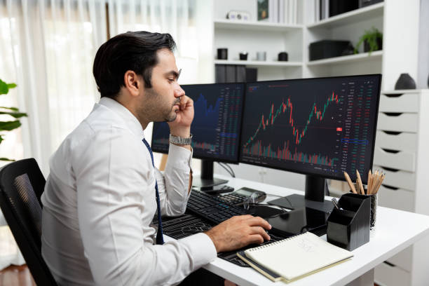 istock Trader analyzing in dynamic stock exchange investment screen on pc. Surmise. 2148240177
