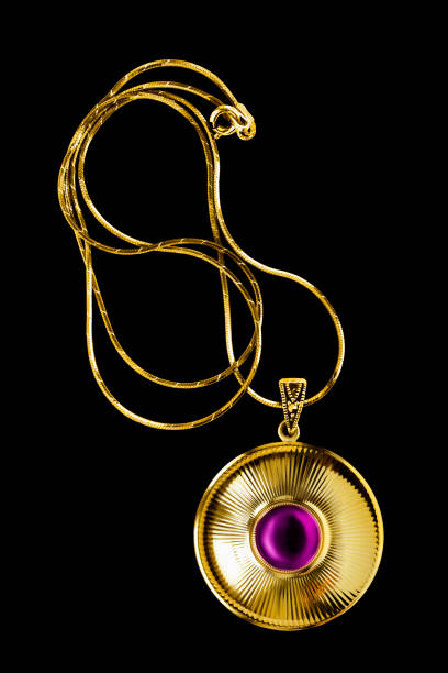 Luxury golden amethyst necklace isolated on black background