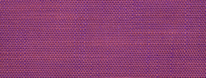 Texture of dark purple color background from woven textile material with wicker pattern, macro. Structure of vintage magenta fabric cloth, narrow backdrop.