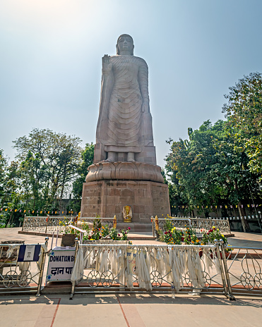80 ft high sandstone made statue of standing Buddha made with joint efforts from India and Thiland is located in Sarnath near Varanasi.