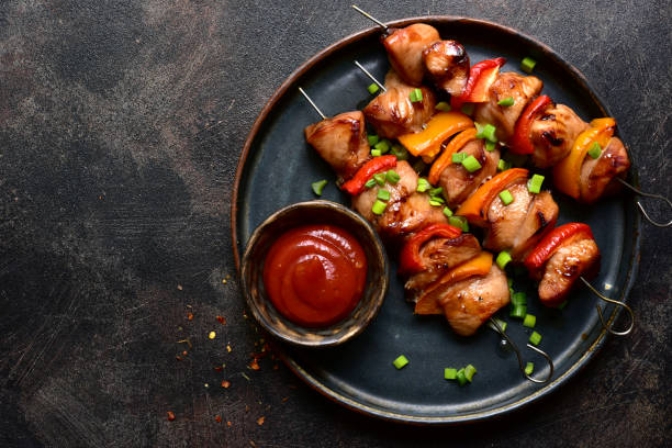 istock Grilled chicken kebab. Top view with copy space. 2148242085