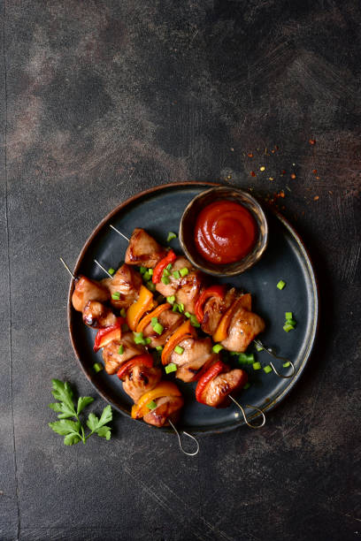 Grilled chicken kebab. Top view with copy space.