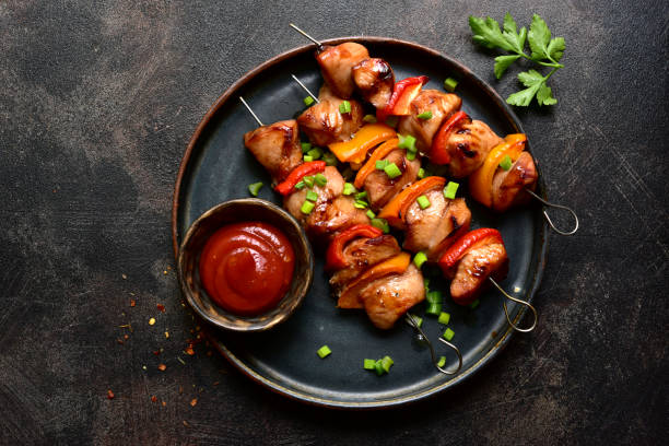 istock Grilled chicken kebab. Top view with copy space. 2148242094