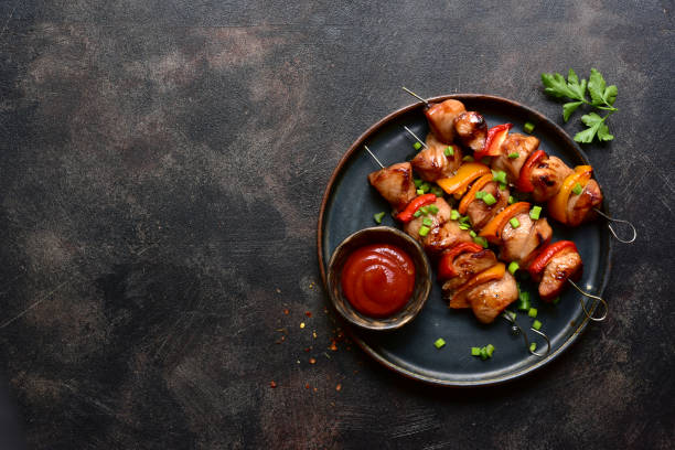istock Grilled chicken kebab. Top view with copy space. 2148242125