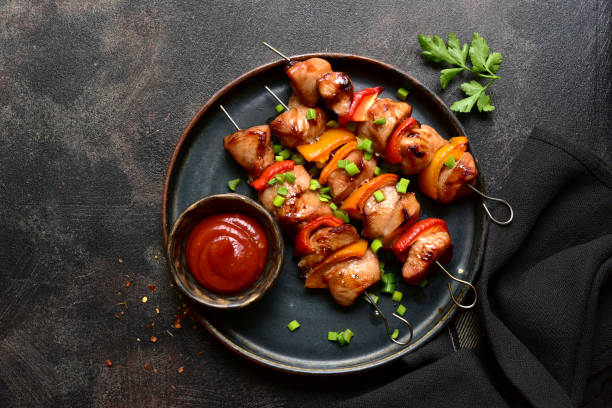 istock Grilled chicken kebab. Top view with copy space. 2148242151