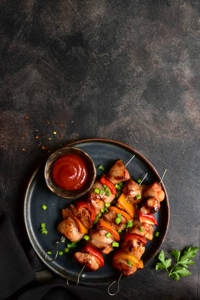 istock Grilled chicken kebab. Top view with copy space. 2148242199