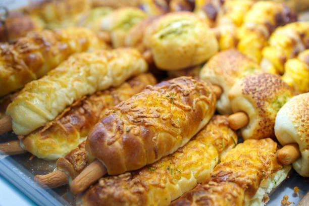 istock A bakery shop displays various freshly baked bread buns, showcasing a range of options for customers. 2148242609
