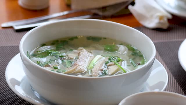 Steaming Bowl of Pho Noodle Soup