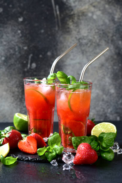istock Cold summer strawberry cocktail with lime and basil in a  glasses . 2148242766