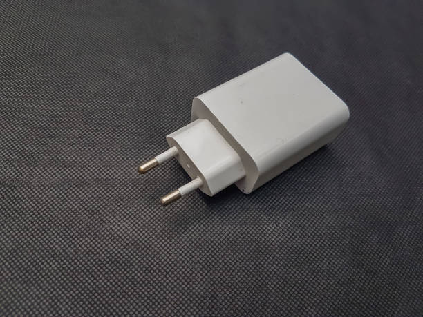 istock white adapter usb port power cord for phone charging. 2148244616