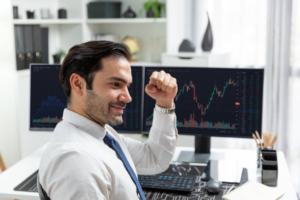 istock Trader analyzing in dynamic stock exchange investment screen on pc. Surmise. 2148244801