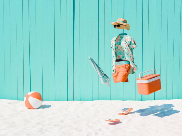 Invisible Man Concept with Summer Beach Apparel Against Turquoise Background