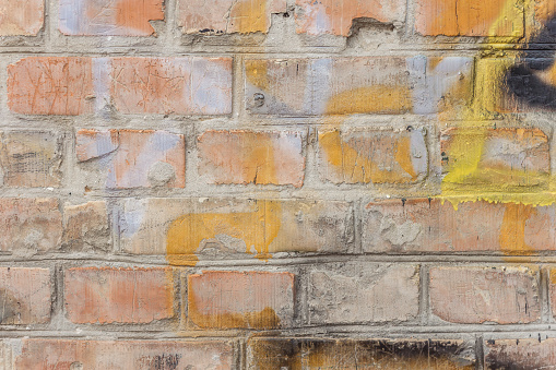 Painted old brick wall. Colorful background
