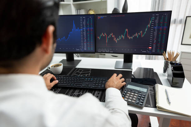 istock Trader analyzing in dynamic stock exchange investment screen on pc. Surmise. 2148245773