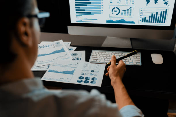 istock Businessman calling with smartphone for consulting business data. Pecuniary. 2148248404