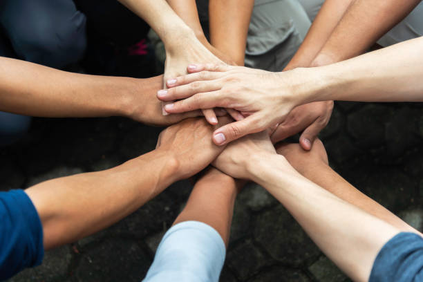istock Diversity people hands join empower partnership teams connect teamwork concepts. 2148250036