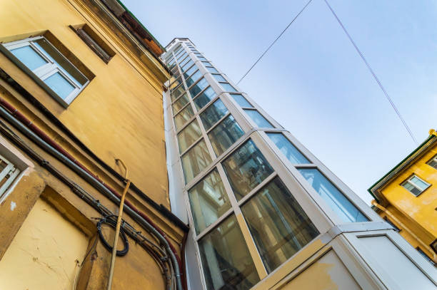 elevator shaft on facade of old building