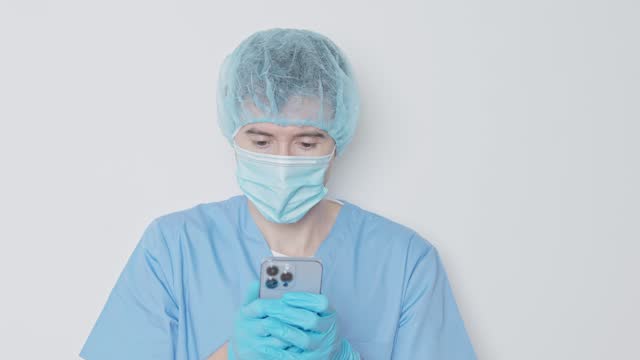 doctor using a mobile phone in the hospital