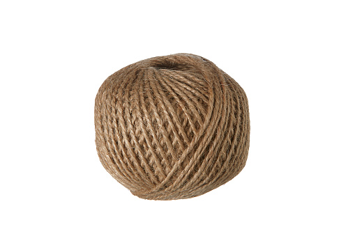 a partly uncoiled  ball of string isolated on white background