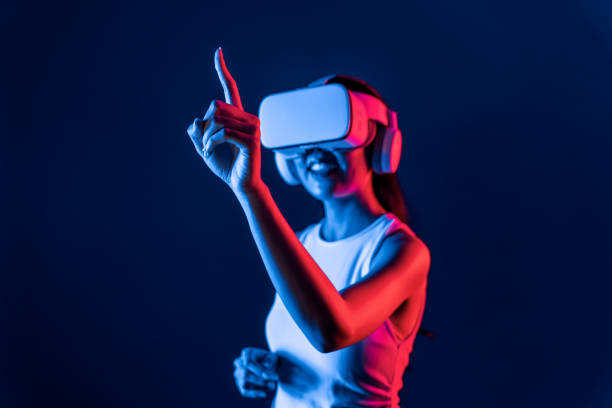 istock Elegant female connect metaverse use finger point virtual object. Hallucination. 2148257610