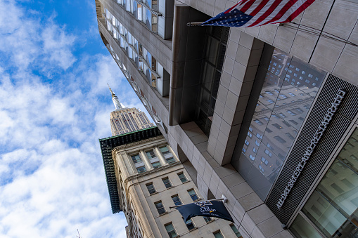 Manhattan, New York, USA - March, 2024. Buildings in front of the Empire State building.