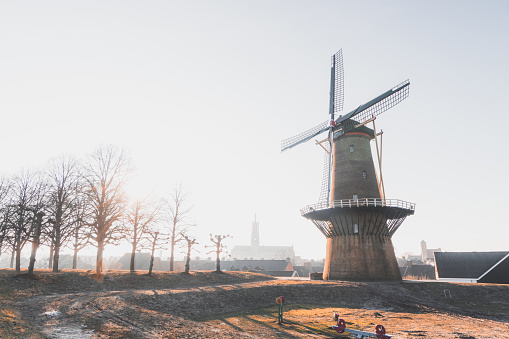 Sunrise at a typical windmill in Hulst, New Netherland. Historic and National Monument of Holland.