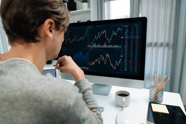 istock Business trader using computer and laptop to search high profit. Pecuniary. 2148260030