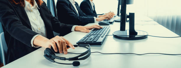 istock Call center wearing headset working in office for customer support oratory 2148260478