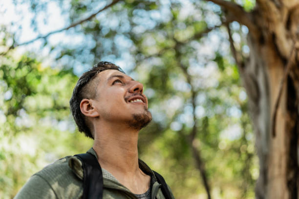 istock Mid adult man contemplating in forest 2148261487