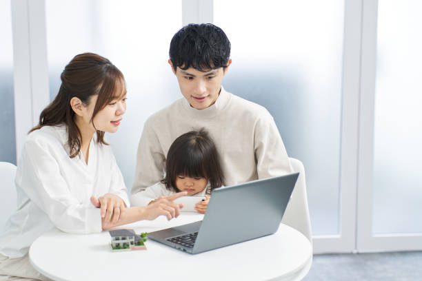 istock Asian family considering real estate 2148261966