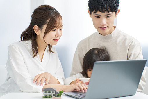 Asian family considering real estate