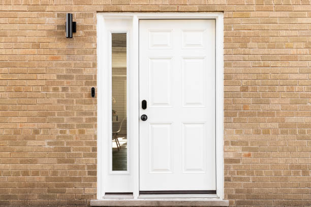 istock A white front door detail with a brick exterior. 2148263249