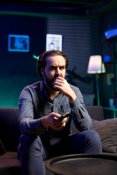 istock Grumpy man looking at football competition, appalled by referee decision 2148263386
