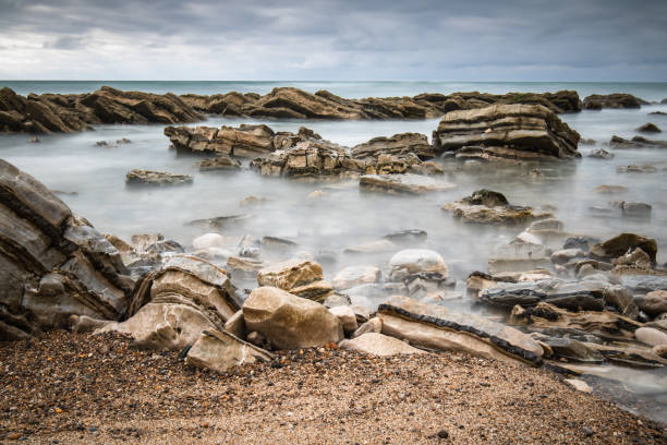 istock atlantic coastline in bidart, rocks and water in long exposure 2148265761