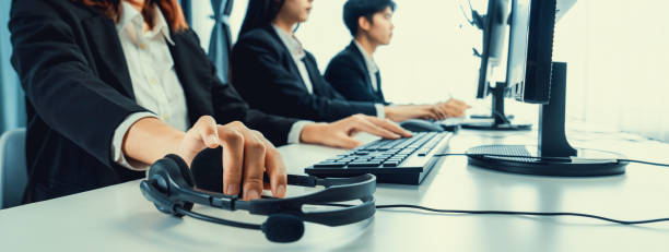 istock Call center wearing headset working in office for customer support oratory 2148267795