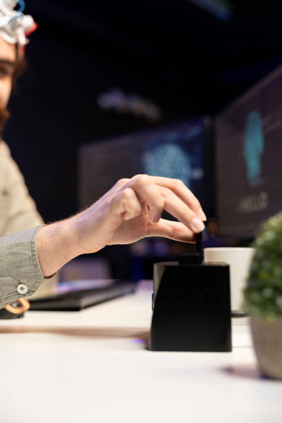 istock Close up of developer putting disk in PC to start consciousness upload 2148268798