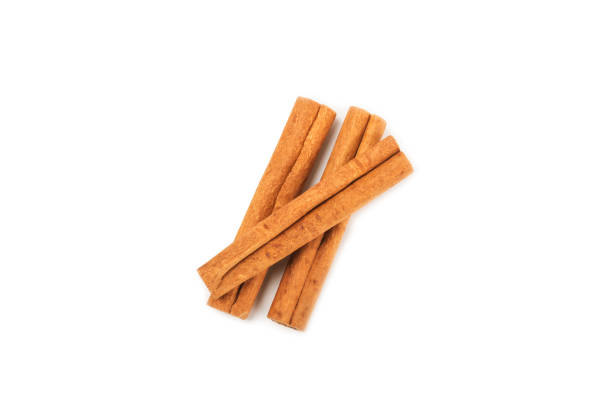 istock Cinnamon sticks isolated on white background. Cinnamon roll. Spicy spice for baking, desserts and drinks. Fragrant ground cinnamon. 2148272245