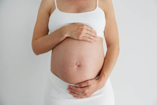 istock Close up of pregnant belly. 2148272619