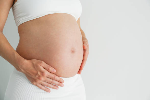 istock Close up of pregnant belly. 2148272649