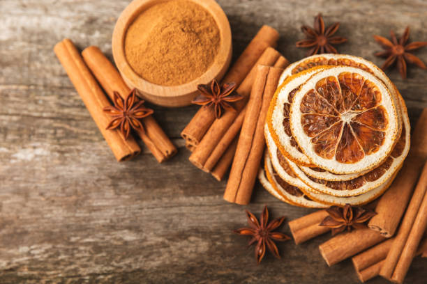 istock Cinnamon sticks and anise on a textured background. Cinnamon roll and star anise. Spicy spice for baking, desserts and drinks. Fragrant ground cinnamon.Place for text. copy space. 2148272789