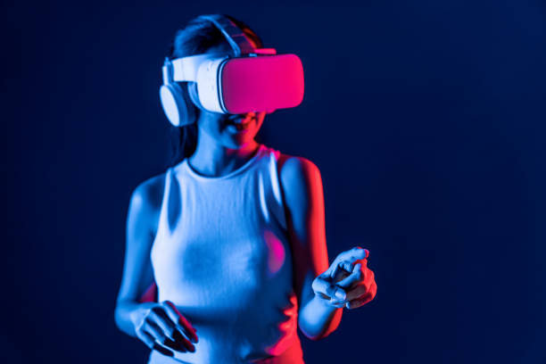 istock Elegant female connect metaverse use finger point virtual object. Hallucination. 2148272848