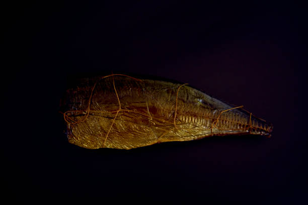 istock appetizing hot smoked golden horse mackerel on a black background 2148273945