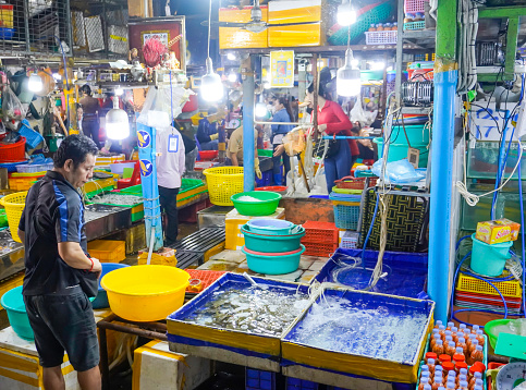 Sihanoukville, Cambodia -December 18, 2023: streets in Sihanoukville in Cambodia. city market in Sihanoukville Phsar Leu Market. People sell food and manufactured goods