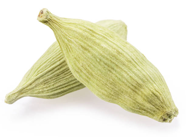 istock Green cardamom pods and seeds isolated on white background. 2148275948