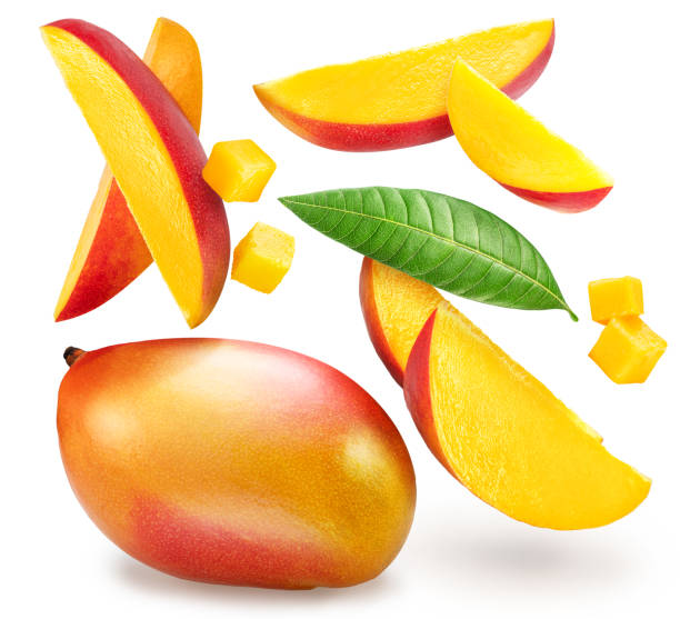 istock Mango fruits and mango slices levitating in air on white background. File contains clipping paths. 2148275989