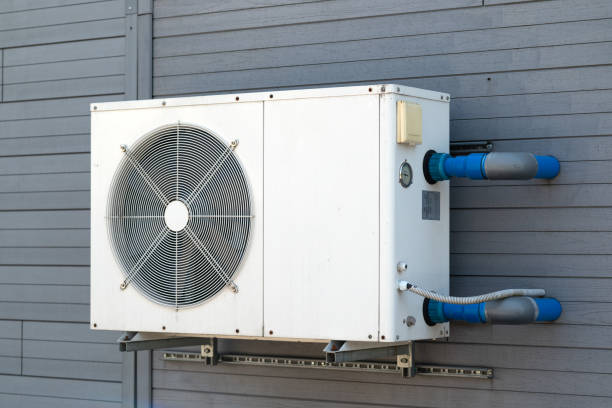istock Condensing unit of air conditioning systems. Condensing unit installed on the gray wall. 2148276608