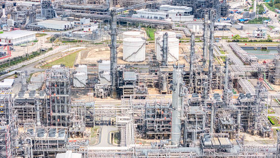 Aerial  view Industry Oil refinery oil and gas refinery background, Business petrochemical industrial, Refinery oil and gas factory power and fuel energy, Ecosystem estates. Fuel refinery industry at morning light