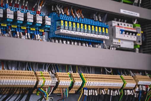 Close-up of circuit board in electricians workshop