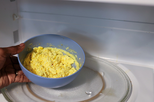 Scrambled eggs cooked in a microwave
