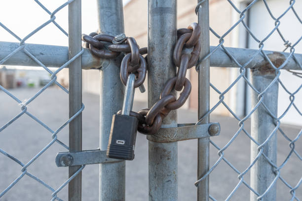 istock Chain link Wire mesh fence fence around a factory 2148278711